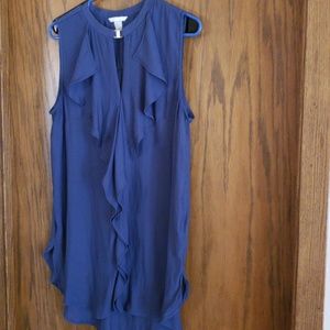 Sleeveless blouse with ruffles